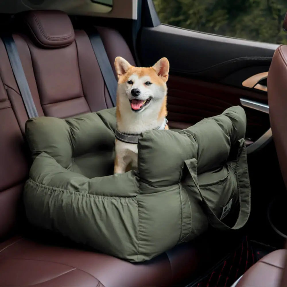Belinana dog car seat booster bed in olive green with comfortable cushioning and safety harness in a car