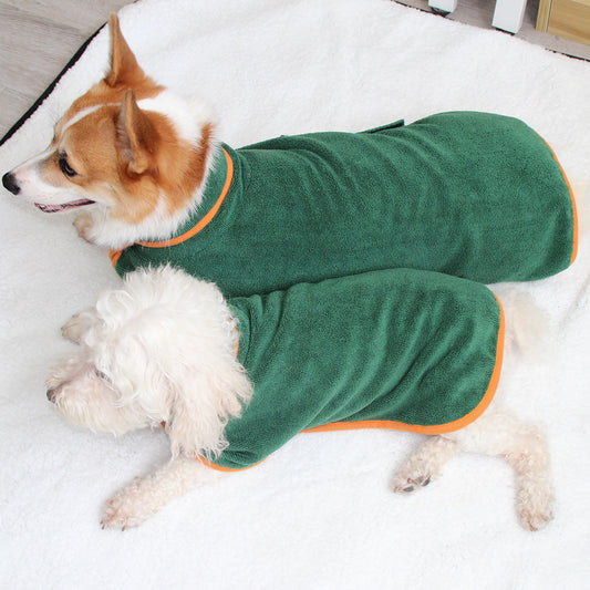 Belinana absorbent bathrobe for cats and dogs in green with orange trim on two dogs lying on a white surface