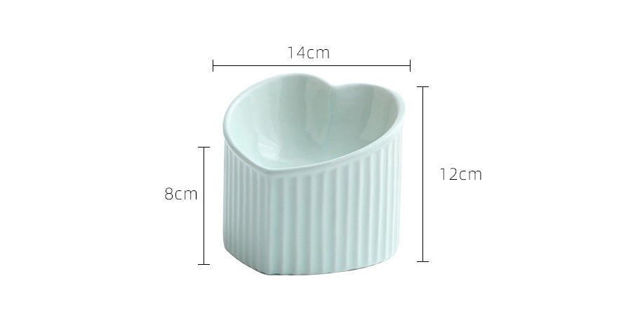 White ceramic pet bowl inclined mouth in heart shape, ideal for cats and small dogs