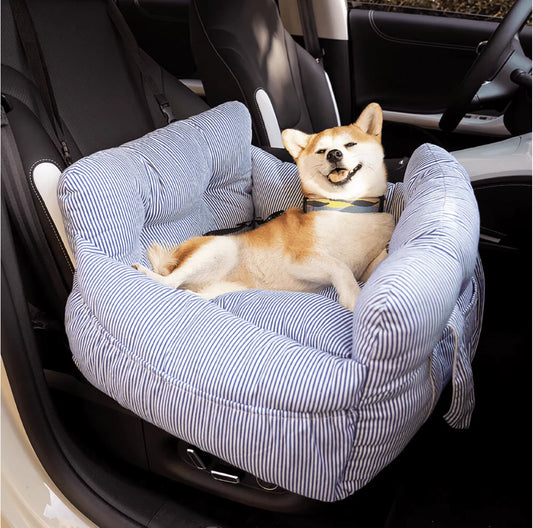 Belinana dog car seat booster bed with blue and white stripes and a happy dog reclining inside